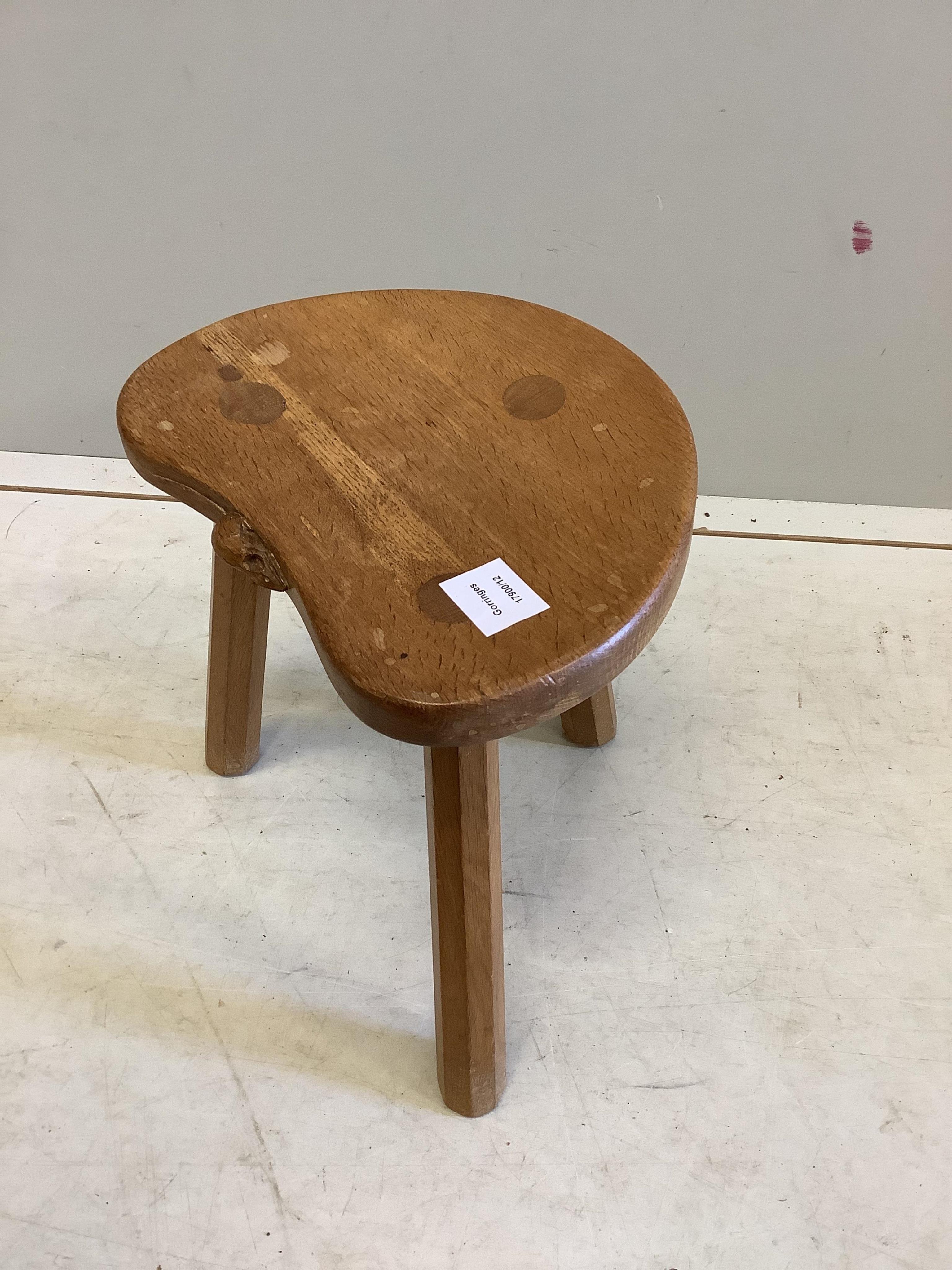 Robert Thompson (the Mouseman) an oak stool, width 30cm, depth 24cm, height 35cm